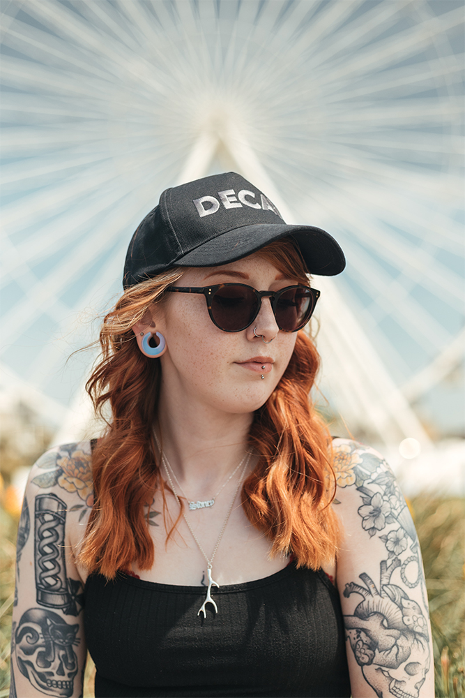 Girl wearing big  Glass Opalite Saddle Plug / Gauge