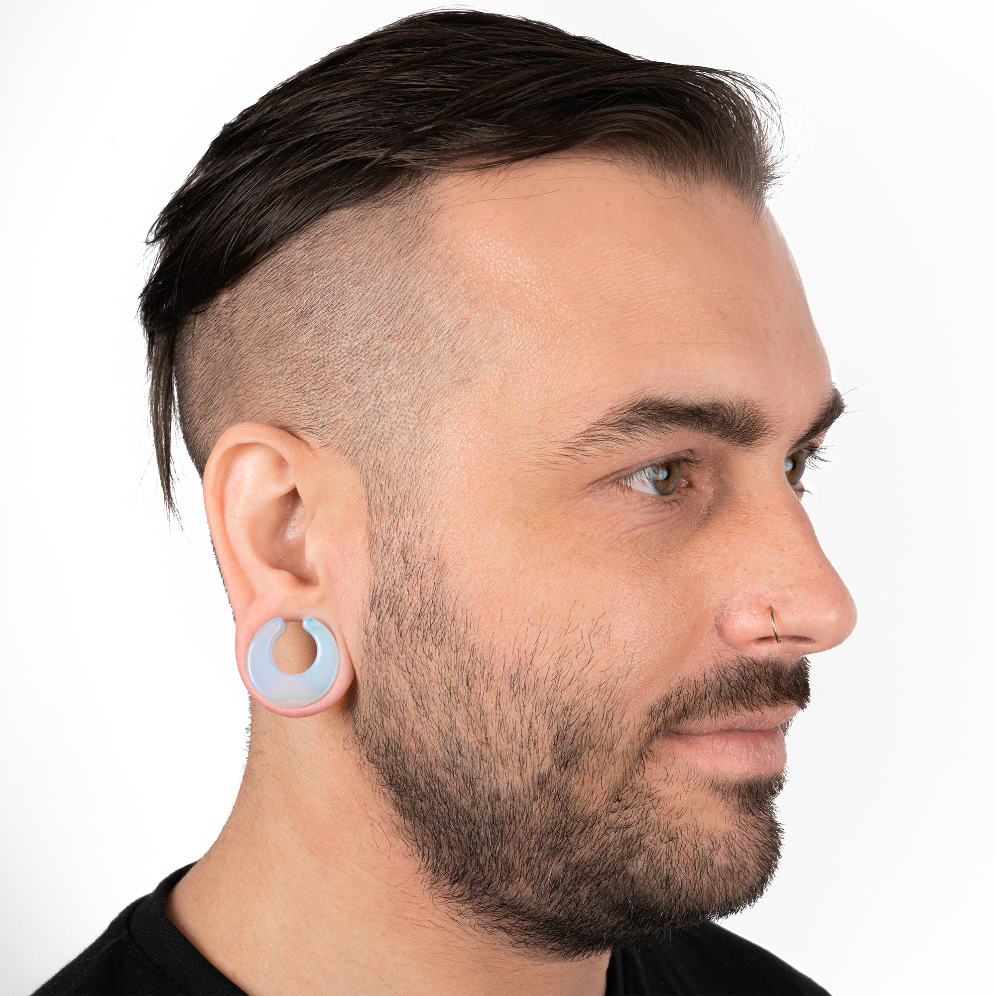 Guy wearing cool  Glass Opalite Saddle Plug / Gauge
