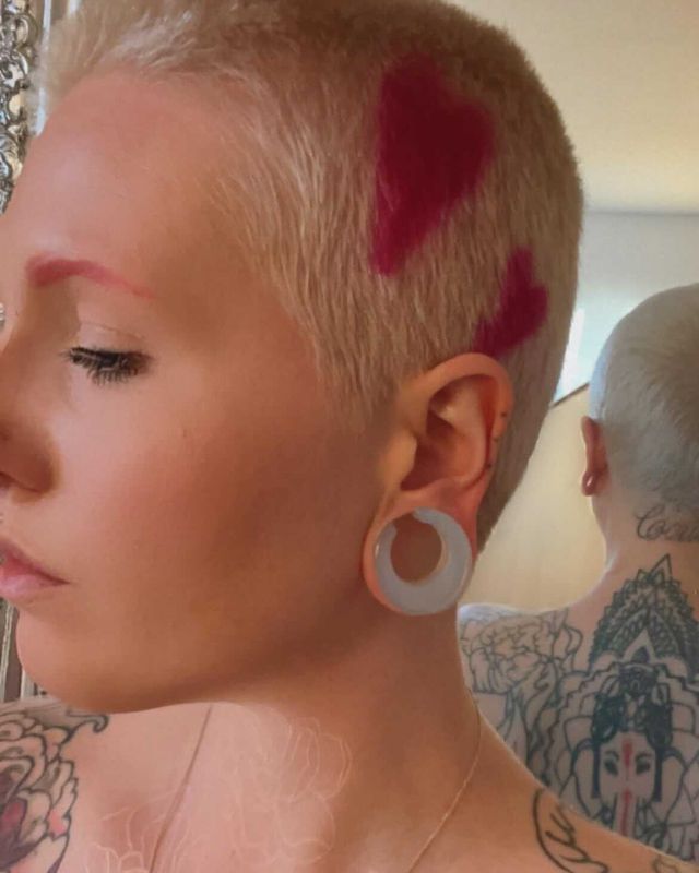Girl wearing punk  Glass Opalite Saddle Plug / Gauge