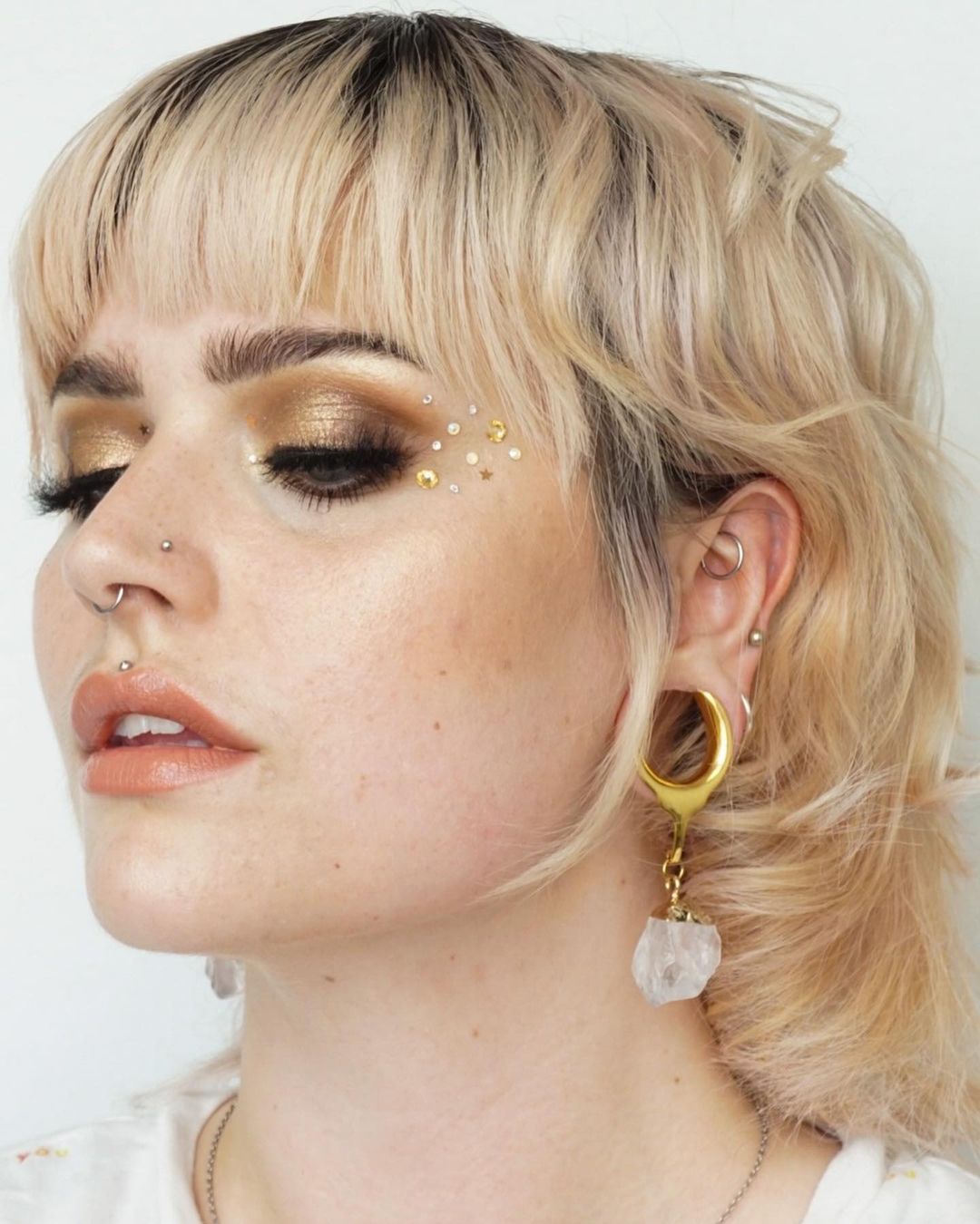 Girl wearing cute Clear Quartz & Gold Saddle Ear Weights (Pair)
