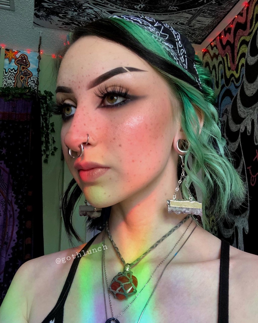 Female wearing heavy  Amethyst & Silver Saddle Ear Weights (Pair)