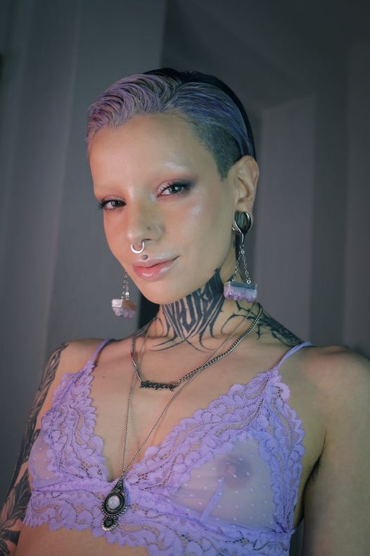 Female wearing alternative  Amethyst & Silver Saddle Ear Weights (Pair)