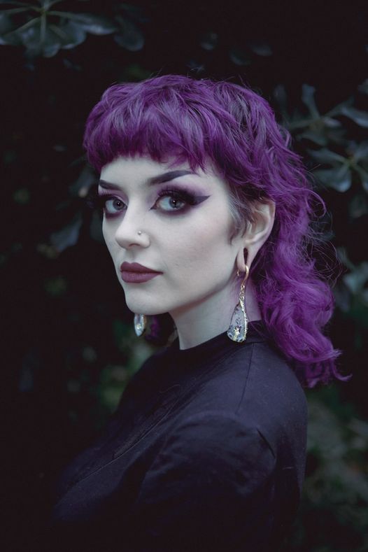 Girl wearing elegant  Gold Hook Geode Slice Crystal Ear Weights (Pair)