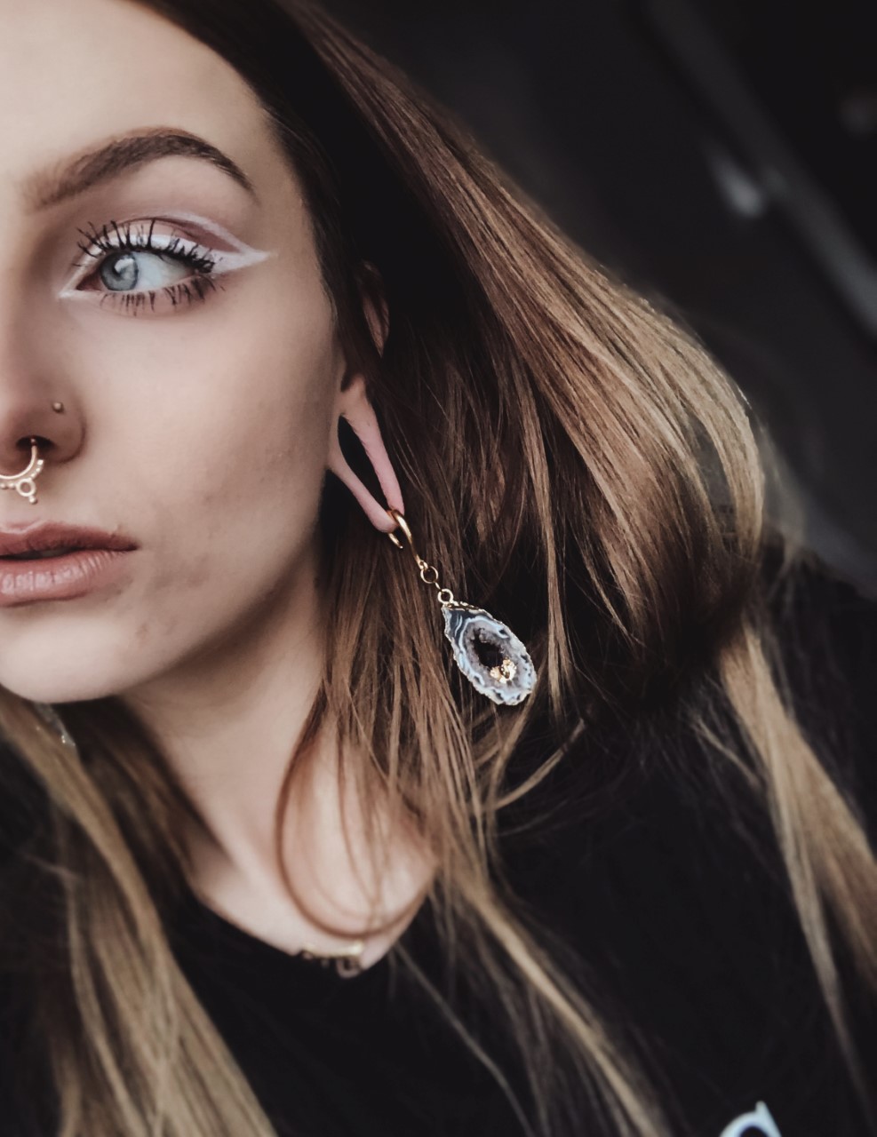 Women wearing heavy  Gold Hook Geode Slice Crystal Ear Weights (Pair)