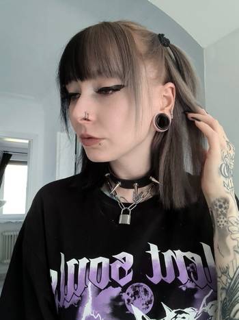 Female wearing cool Black Cats Eye Glass Ear Tunnel