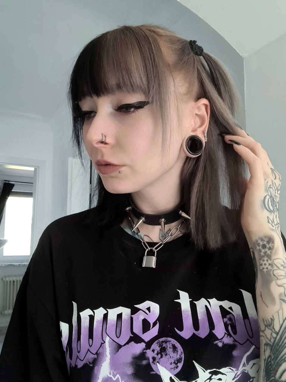 Female wearing cool Black Cats Eye Glass Ear Tunnel