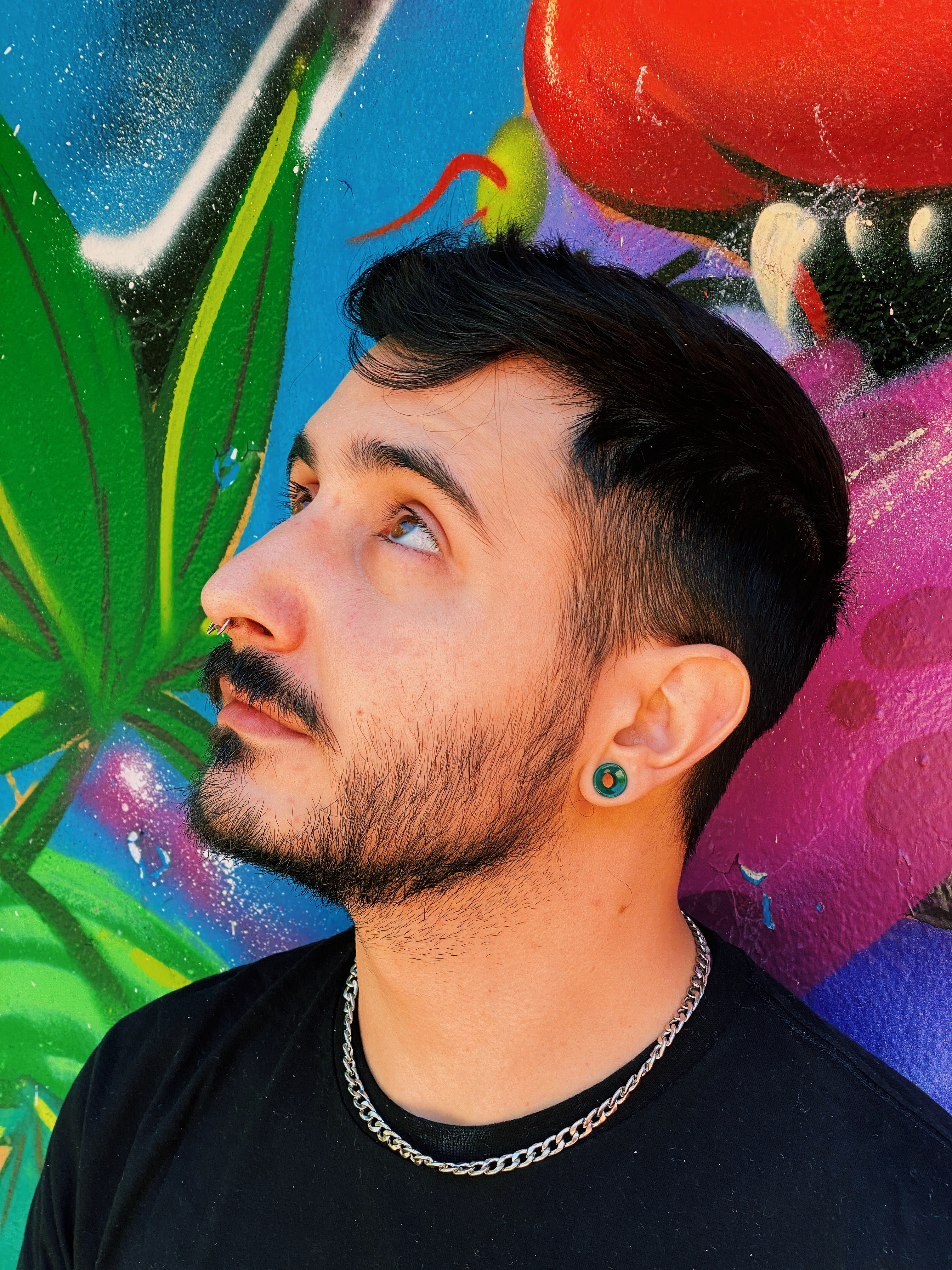 Guy wearing cool  Green Cats Eye Glass Ear Tunnel