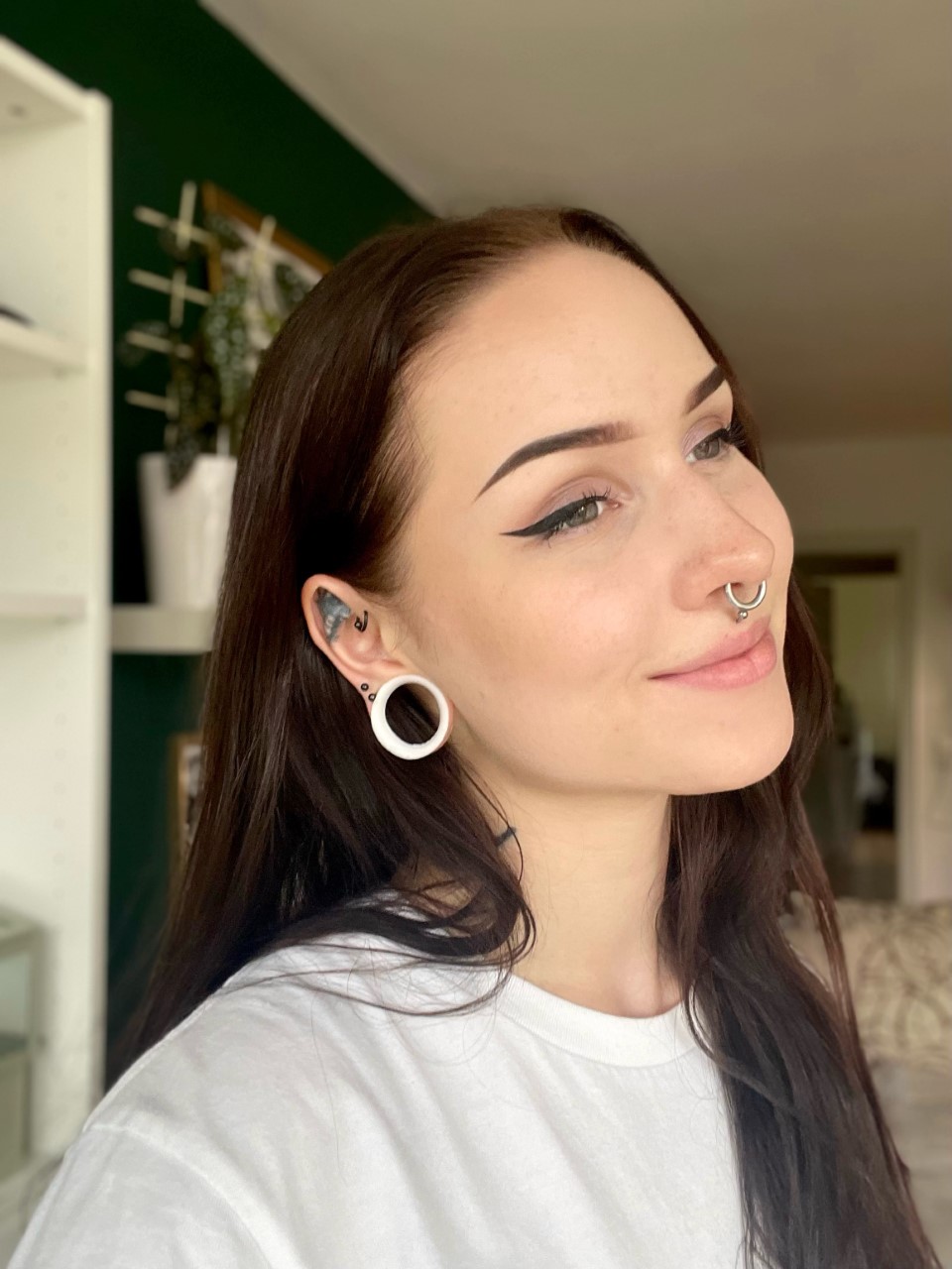 Girl wearing pretty White Eyelet Silicone Ear Tunnel