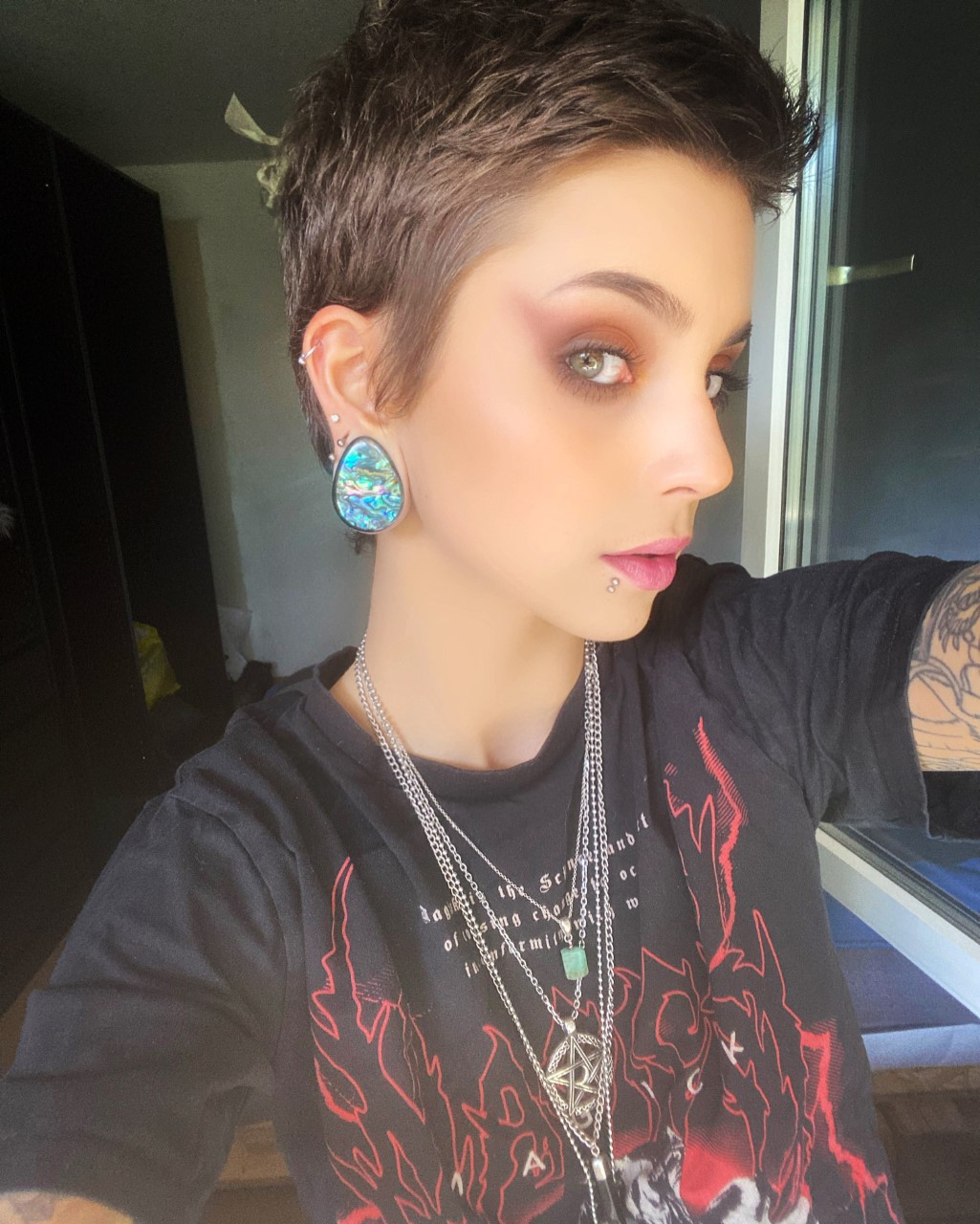 Girl wearing goth  Abalone & Black Steel Teardrop Plug / Gauge