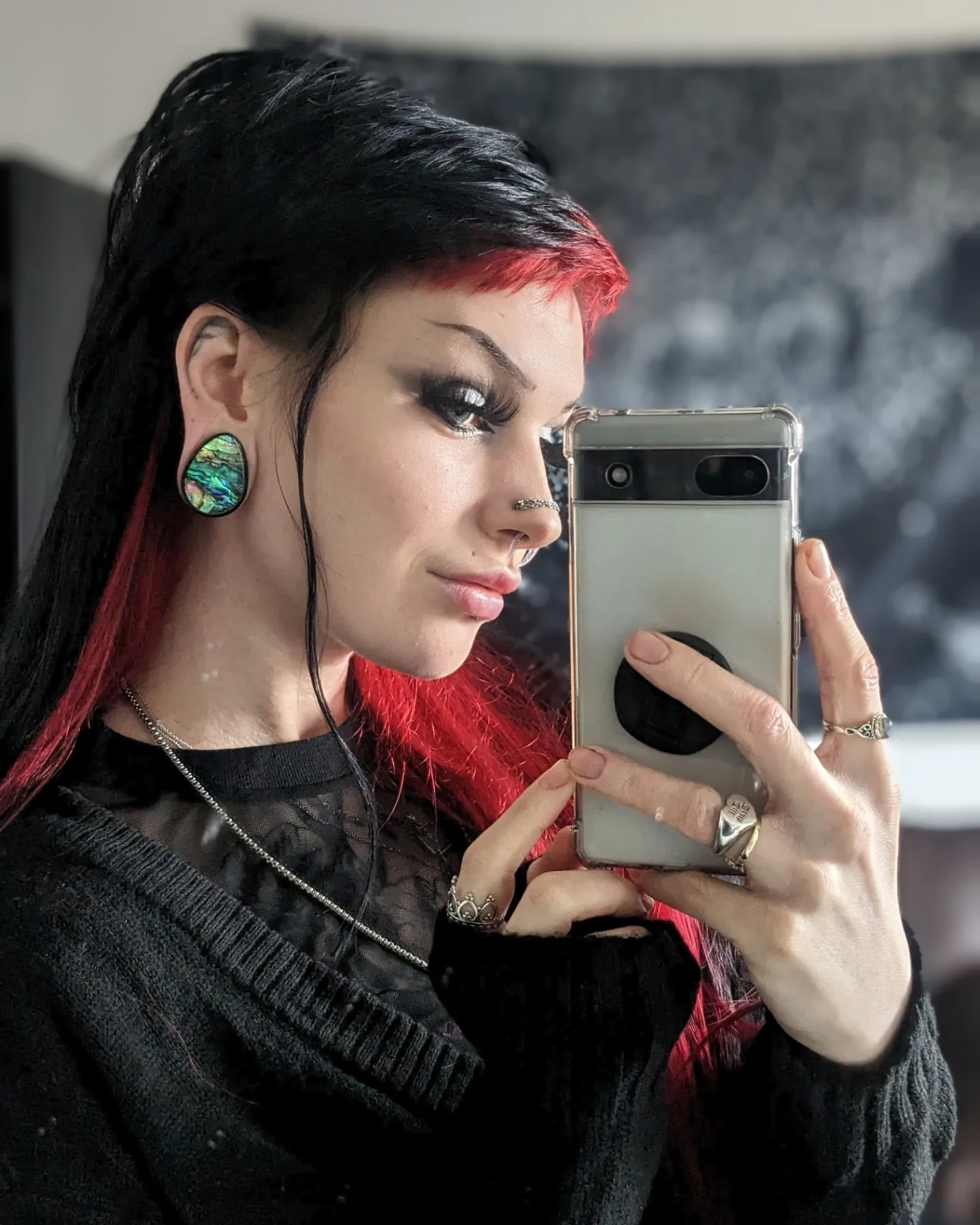 Girl wearing cool  Abalone & Black Steel Teardrop Plug / Gauge