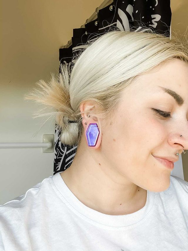Girl wearing big  Iridescent Purple Coffin  Glass Plug / Gauge