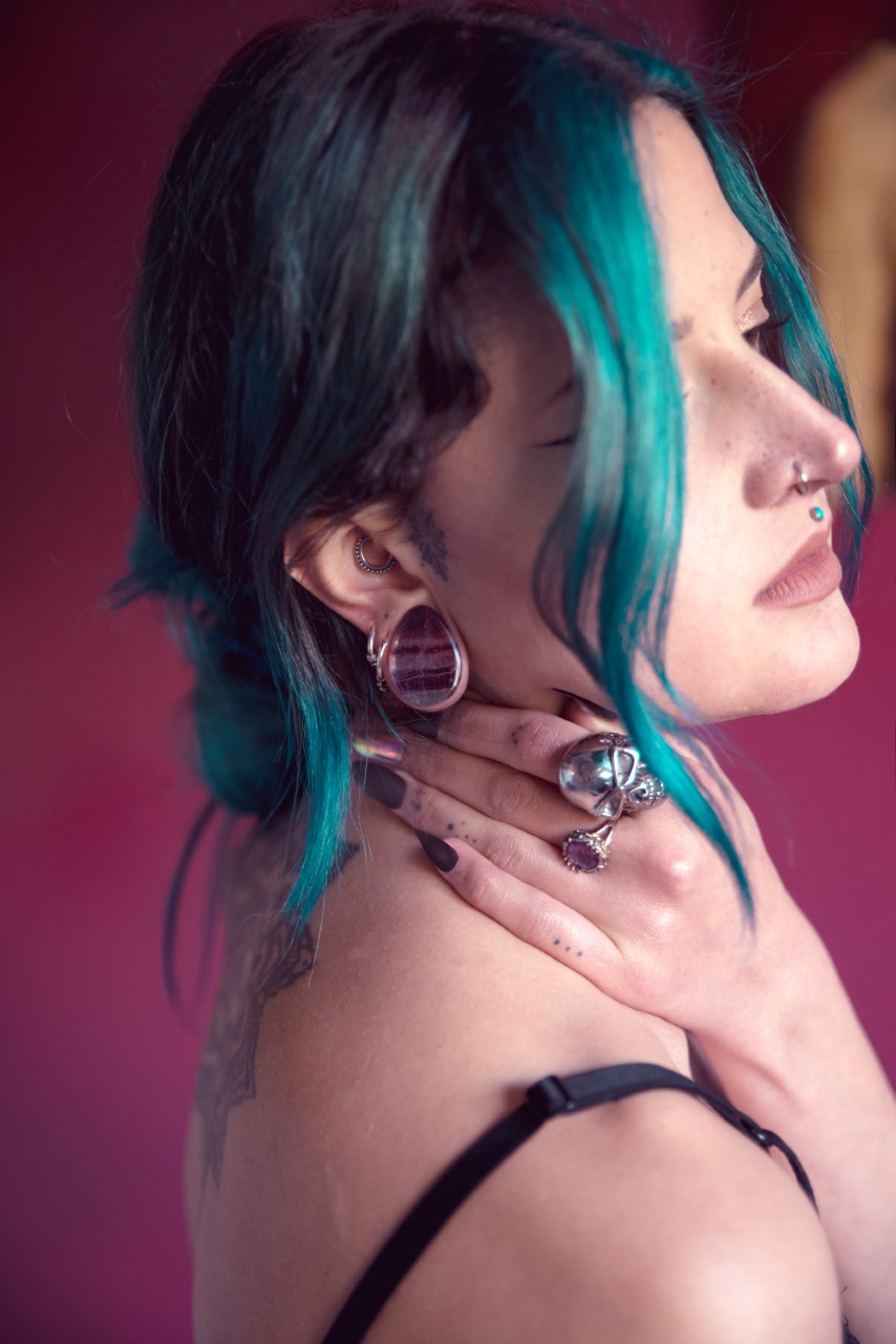 Women wearing big Teardrop Rainbow Fluorite Stone Plug / Gauge