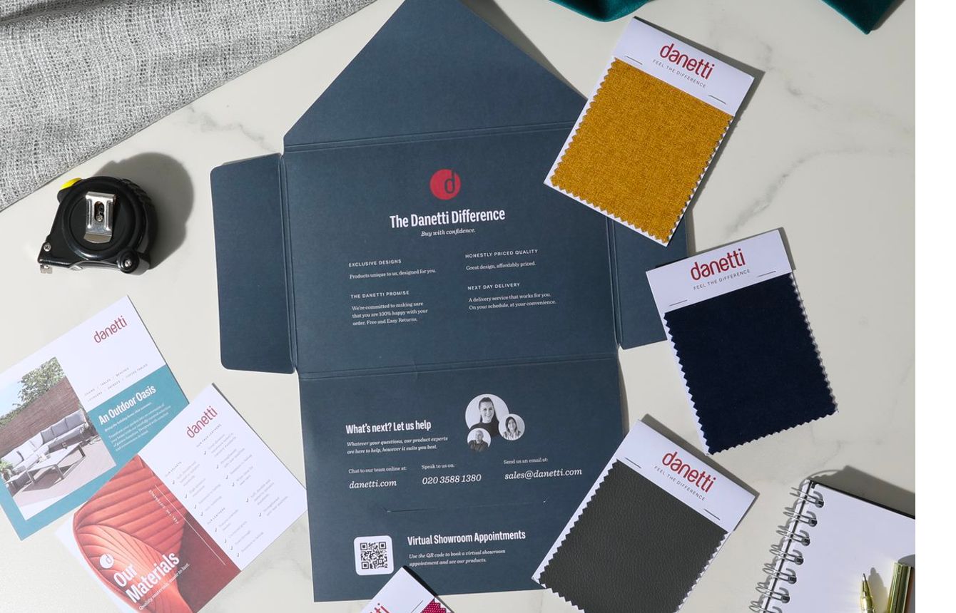 Thea Black Round Coffee Table and Light Grey Pouffe Set