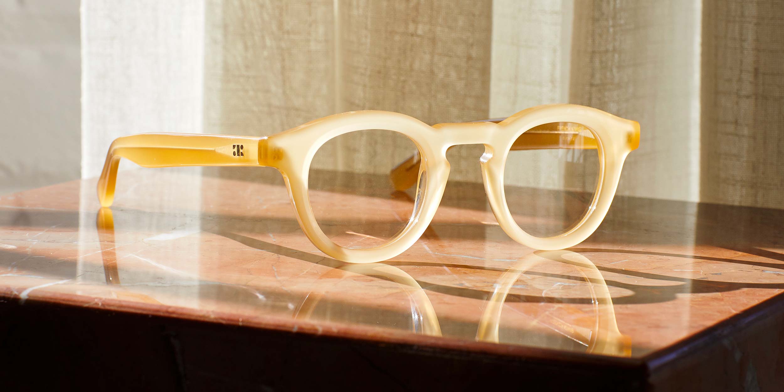 Photo Details of Jude Cognac Reading Glasses in a room
