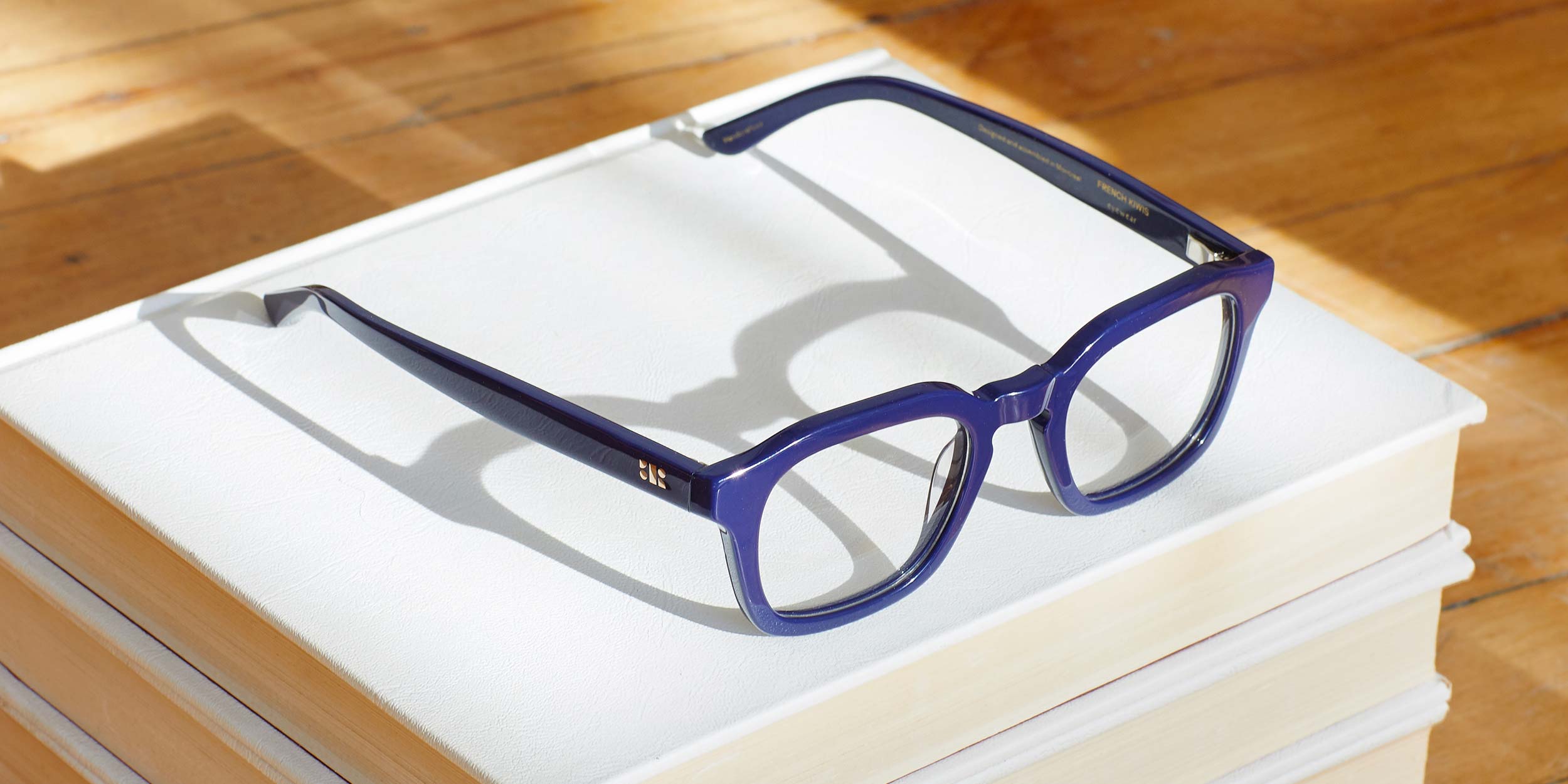 Photo Details of Oscar Grey Marble Reading Glasses in a room