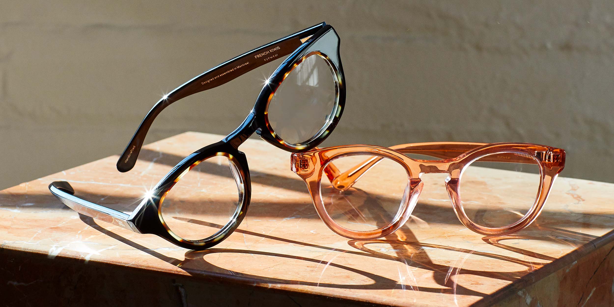 Photo Details of Sydney Rosé & Peach Marble Reading Glasses in a room