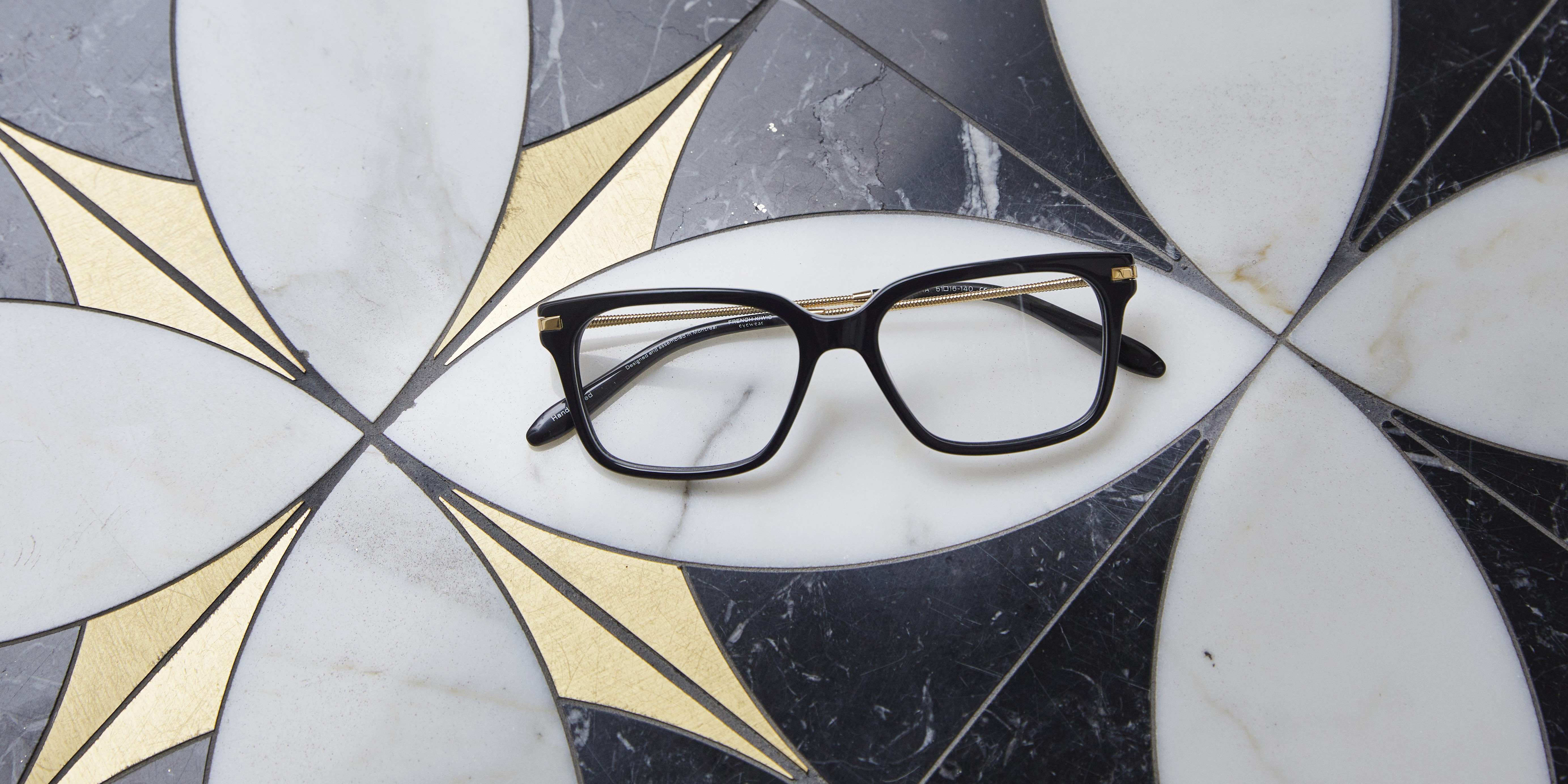 Photo Details of Sasha Black & Gold Reading Glasses in a room