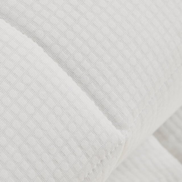 Detailed view of the technology and materials on the Slumber Cloud Performance Mattress Pad