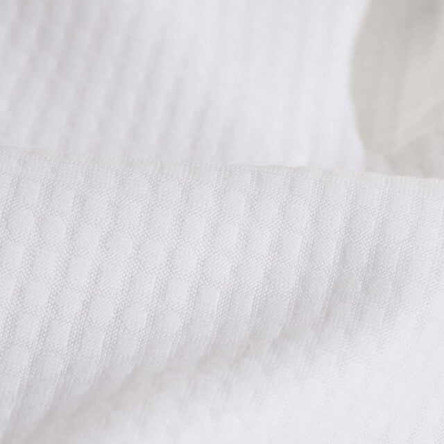 A detailed view of the technology and materials on the Slumber Cloud Performance Pillow Covers