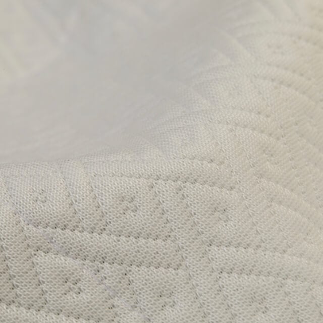 Close up image of the Slumber Cloud Core Mattress Protector outer material