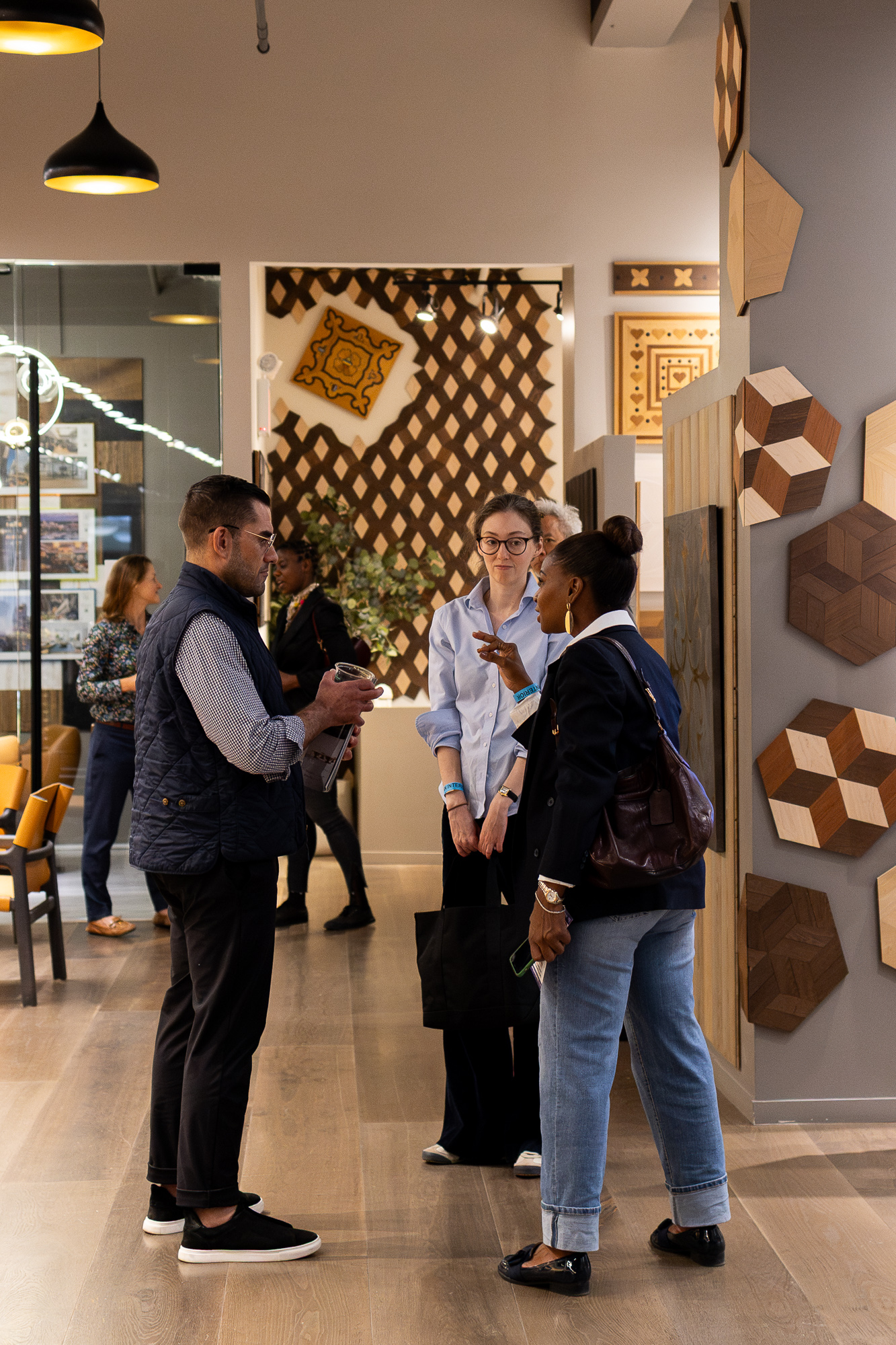 Guests viewing premium wood flooring selections at the PID Floors New York showroom