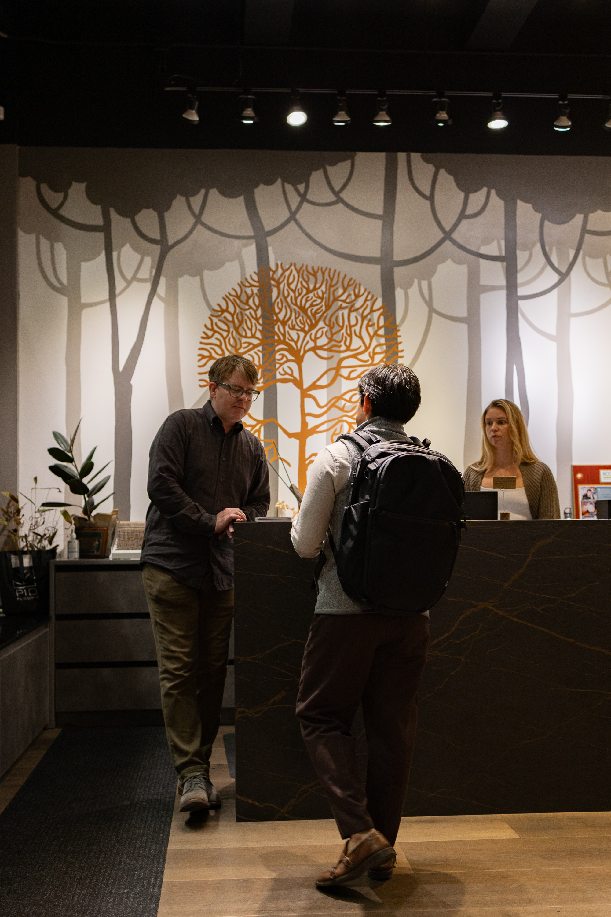 Guests discovering luxury wood flooring and interior design inspiration at PID Floors NYC