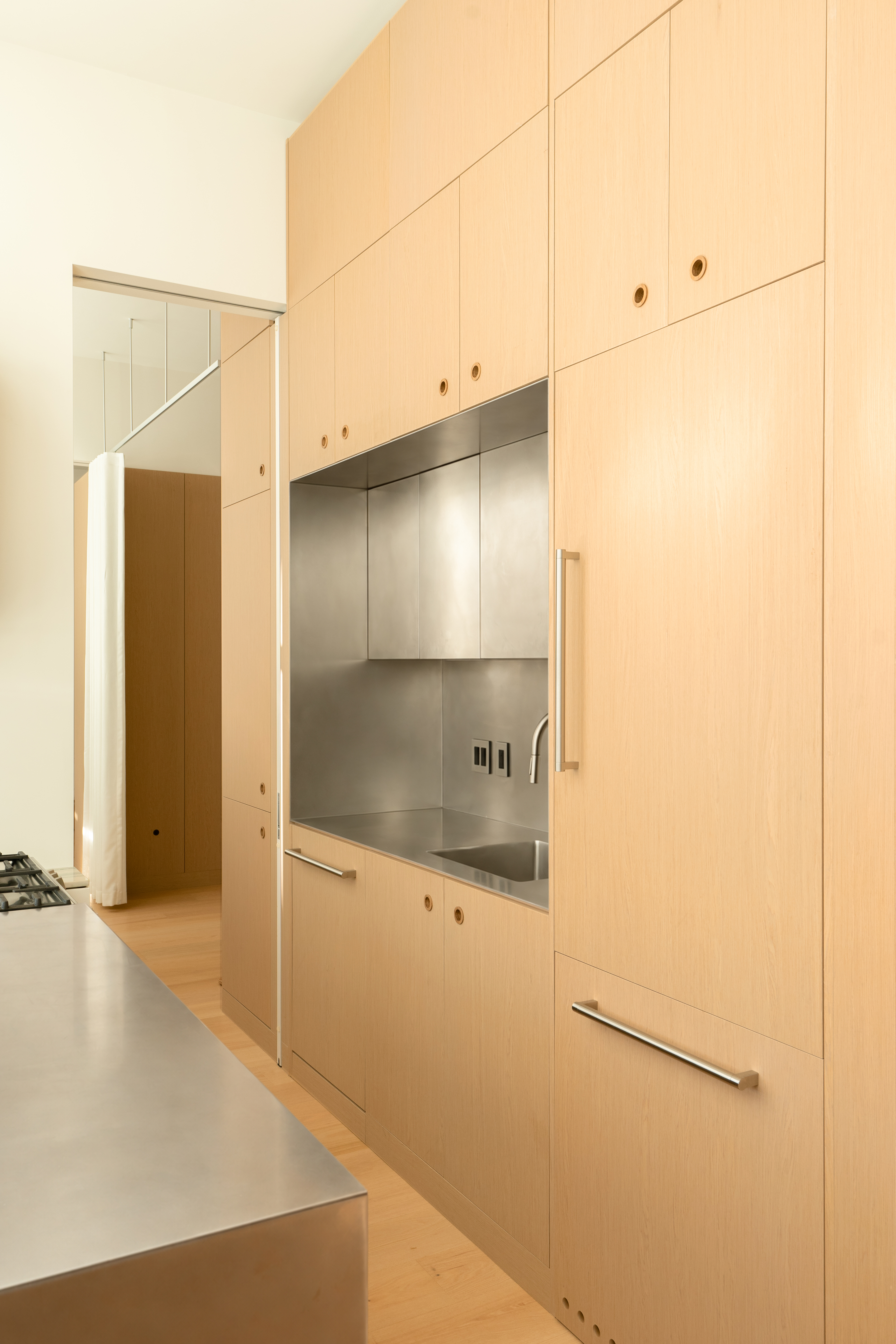 Wood flooring enhancing the open living and dining space of a Carroll Gardens residence