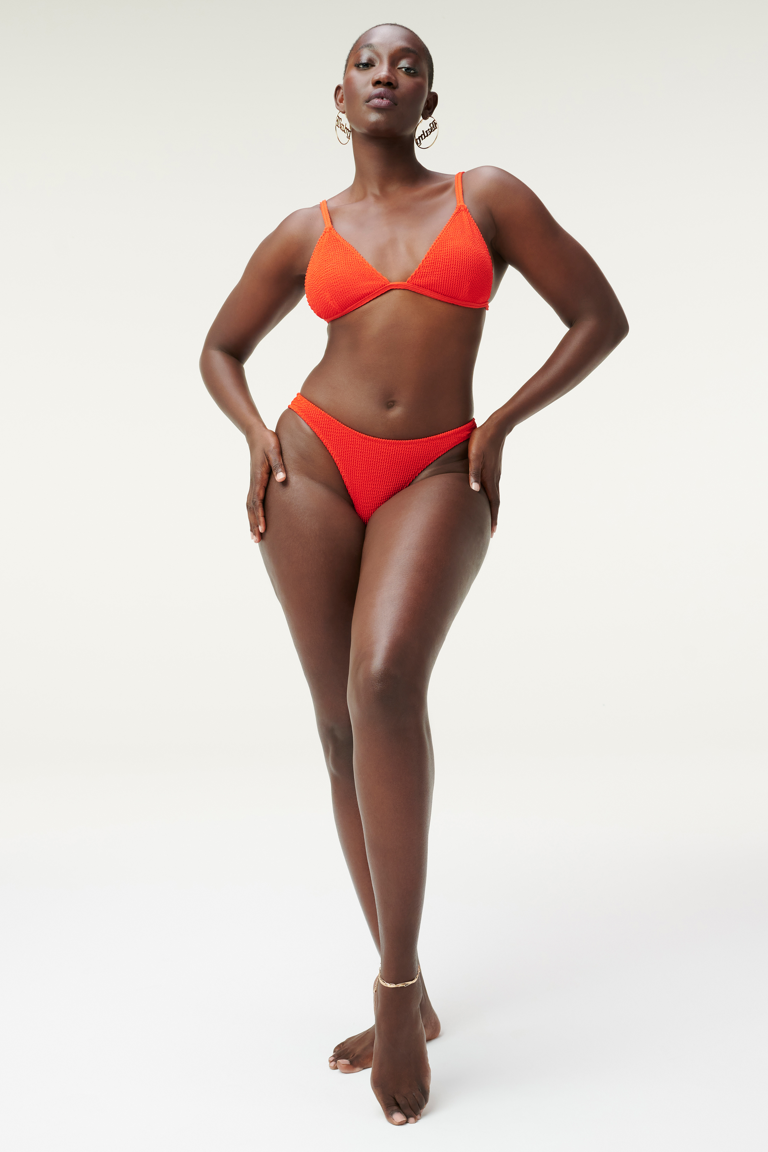 ALWAYS FITS BETTER BIKINI BOTTOM in BRIGHT POPPY002 styled with our ALWAYS FITS MINI SKIRT in BRIGHT POPPY002, or ALWAYS FITS BETTER BAND BIKINI TOP in BRIGHT POPPY002