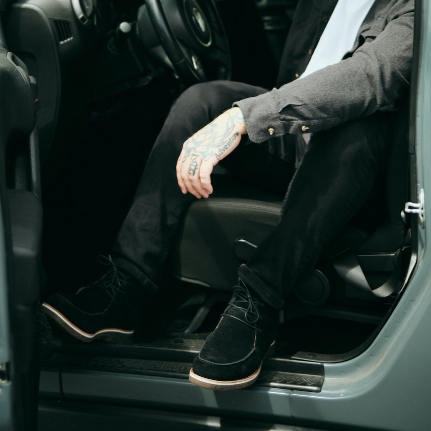 HELM - Man sitting in car wearing Whalen Onyx