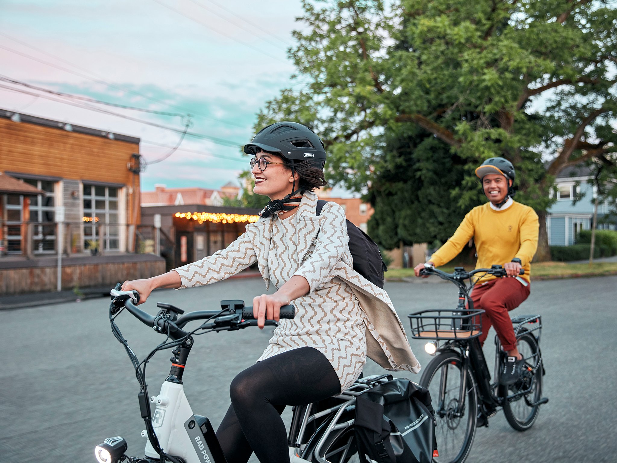 man and woman riding a radcity 5 plus ebike