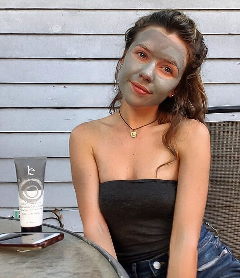 woman using BBE hydrating face mask 
