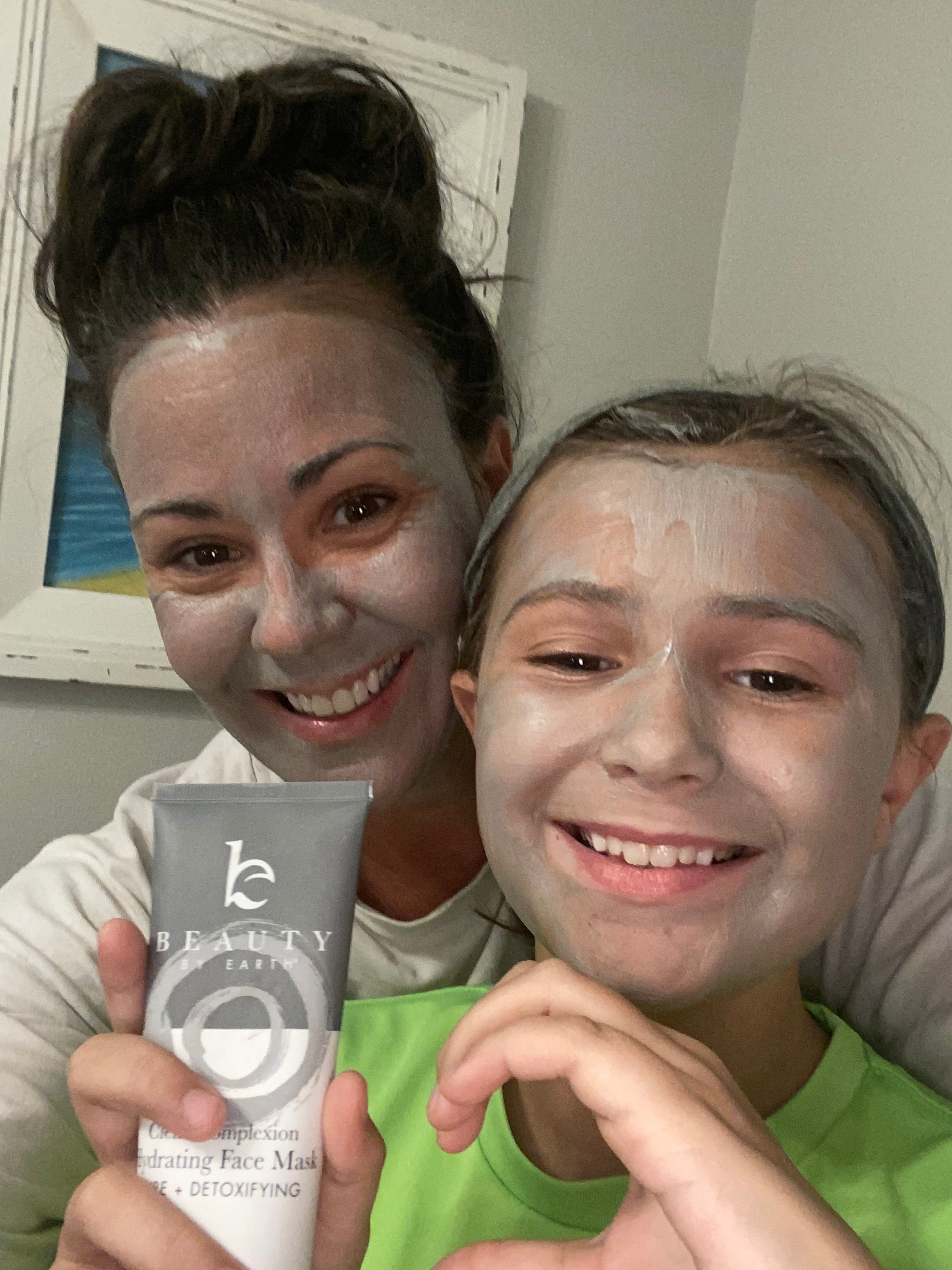 Mother and daughter using BBE hydrating face mask