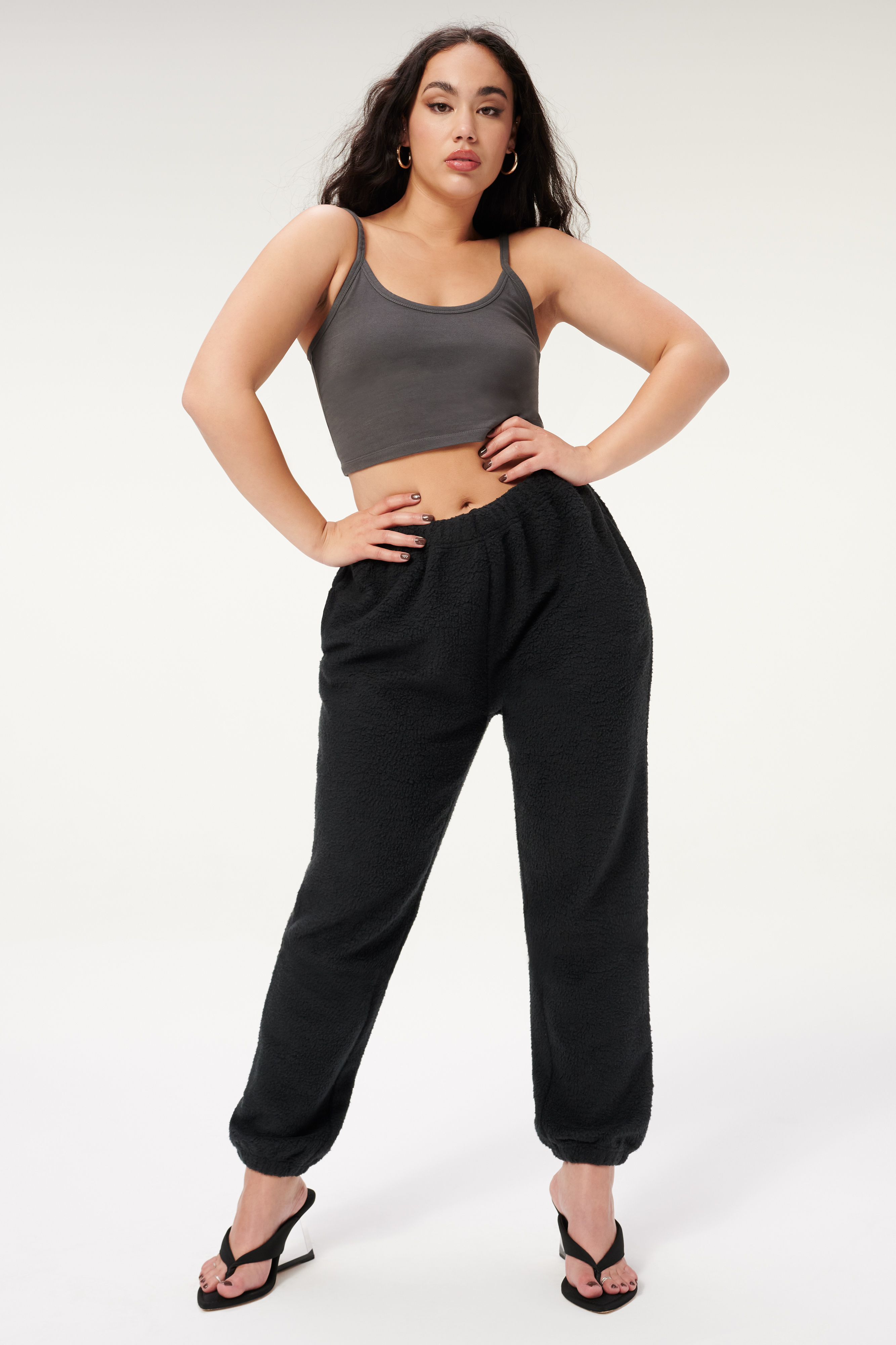 SHERPA BOYFRIEND SWEATPANT in BLACK001 styled with our ESSENTIAL STRAPPY CROP TANK in SHADOW001, or CINDER-F*CKING-RELLA WEGDE in NEOPRENE BLACK001