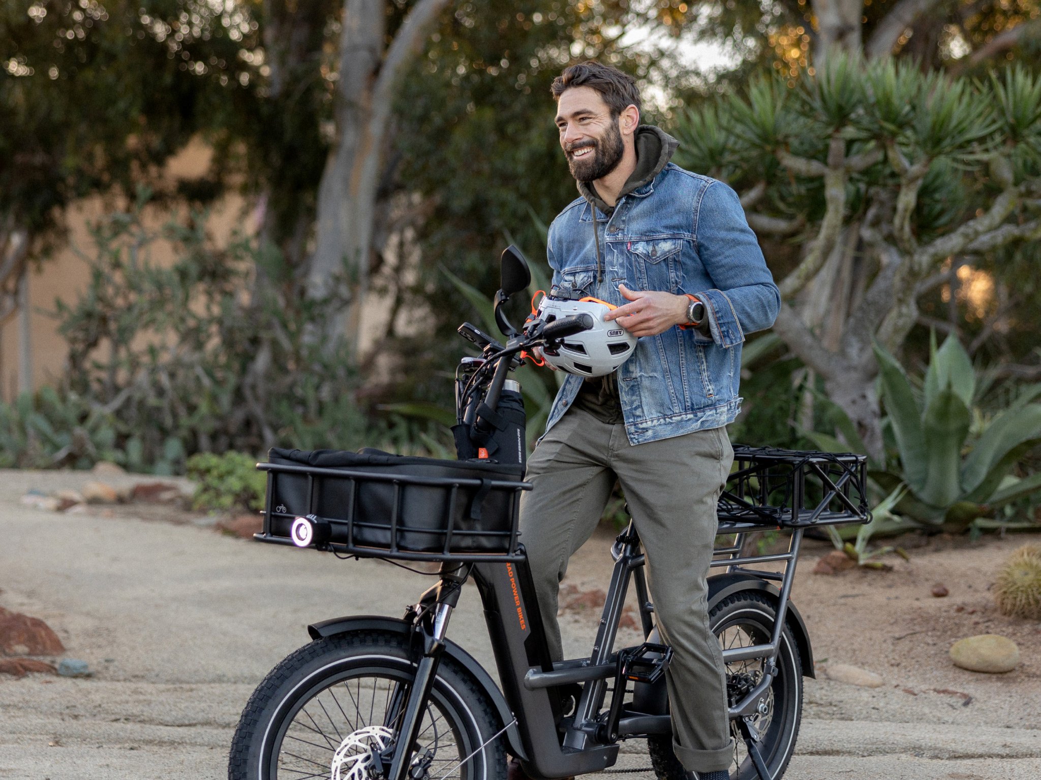 man sitting on a rad power bikes radrunner 3 plus ebike