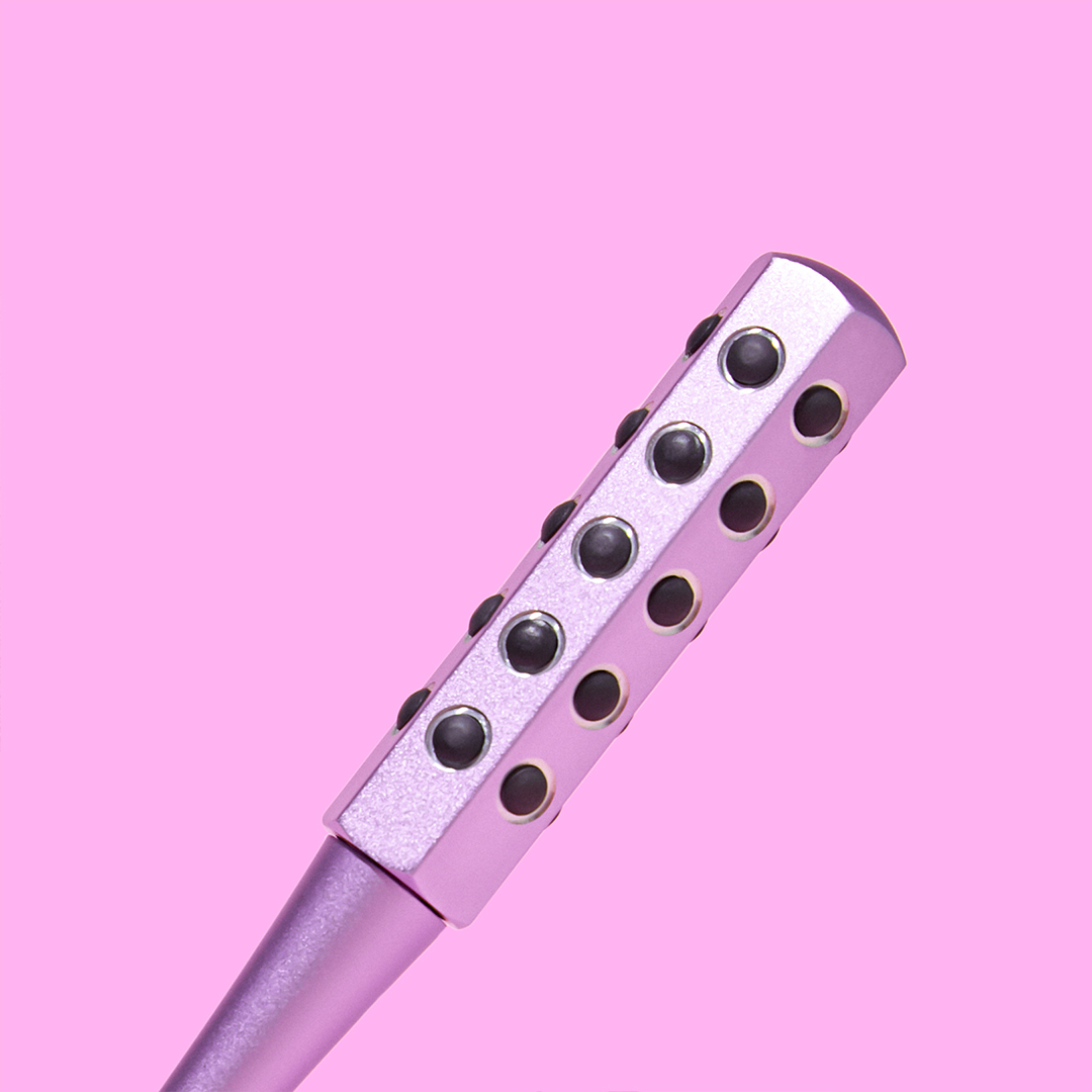 Remi facial massager wand in rose gold / pink by Fancii and Co