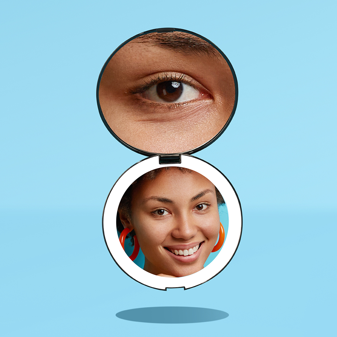 The Lumi lighted compact mirror by Fancii has both 1X and 10X magnifying mirrors