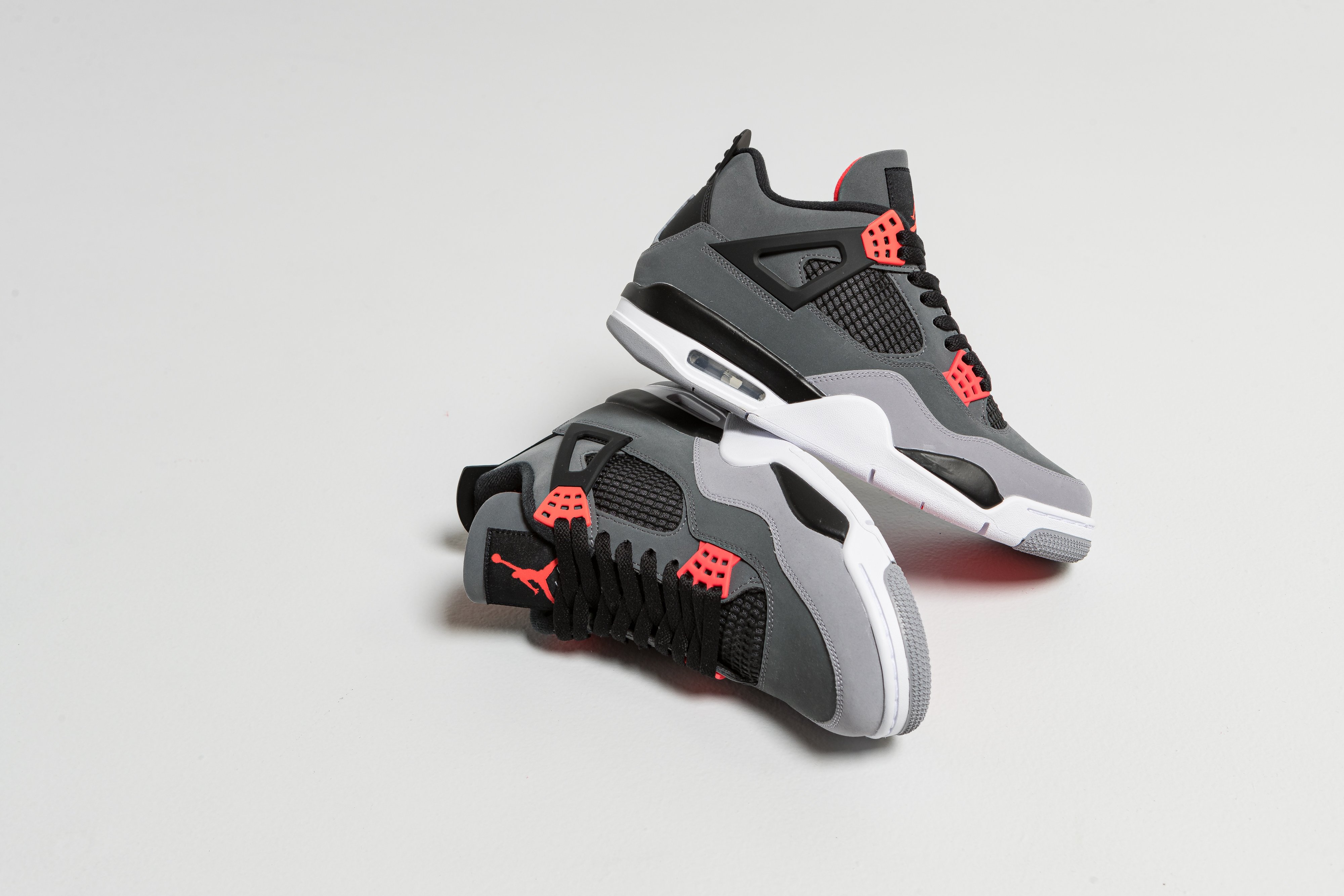 Jordan - Air Jordan 4 Retro - Dark Grey/Infrared-Black-Cement Grey - Up There