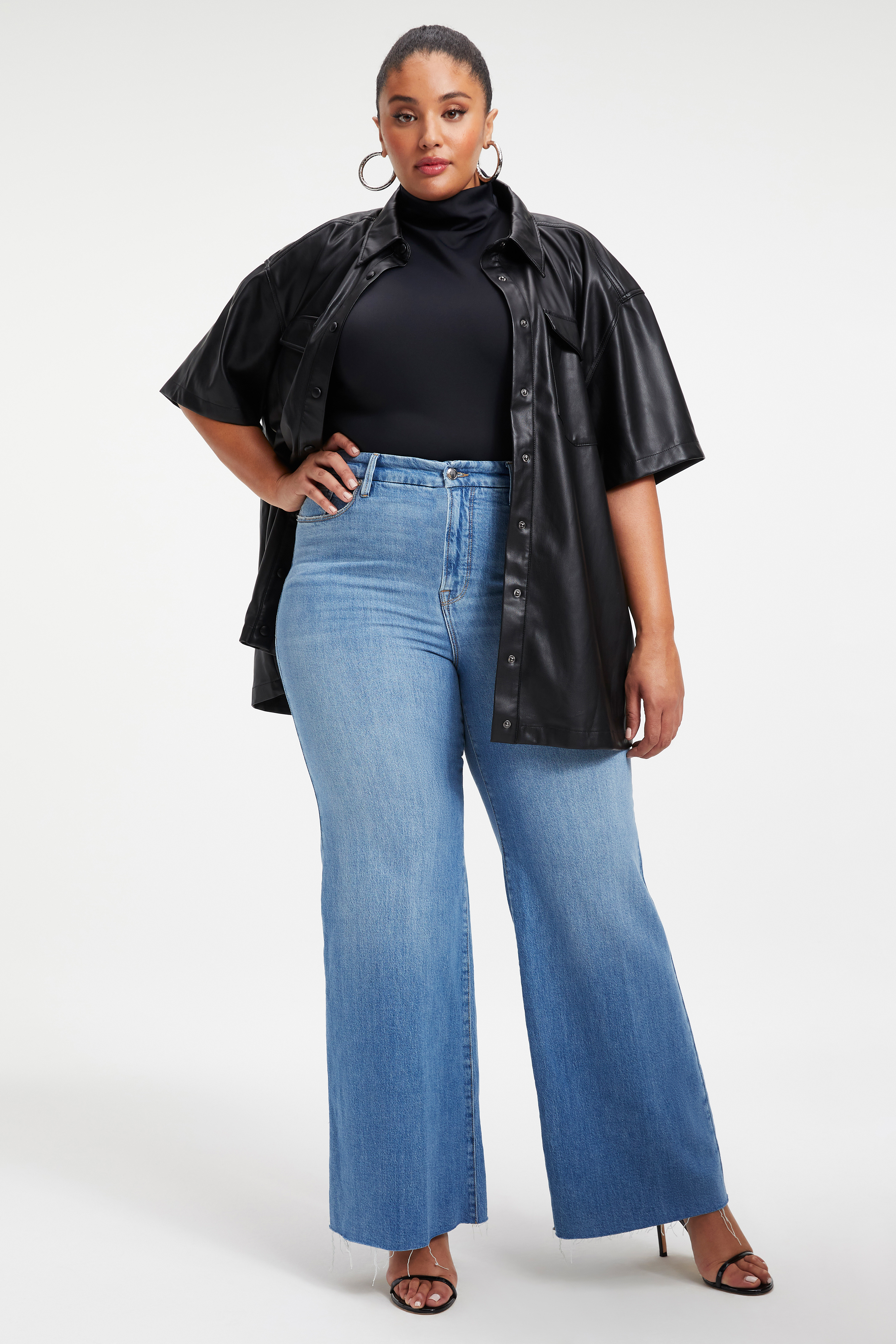 FAUX LEATHER SHORT SLEEVE SHIRT in BLACK001 styled with our SEAMLESS MOCK NECK BODYSUIT in BLACK001,
