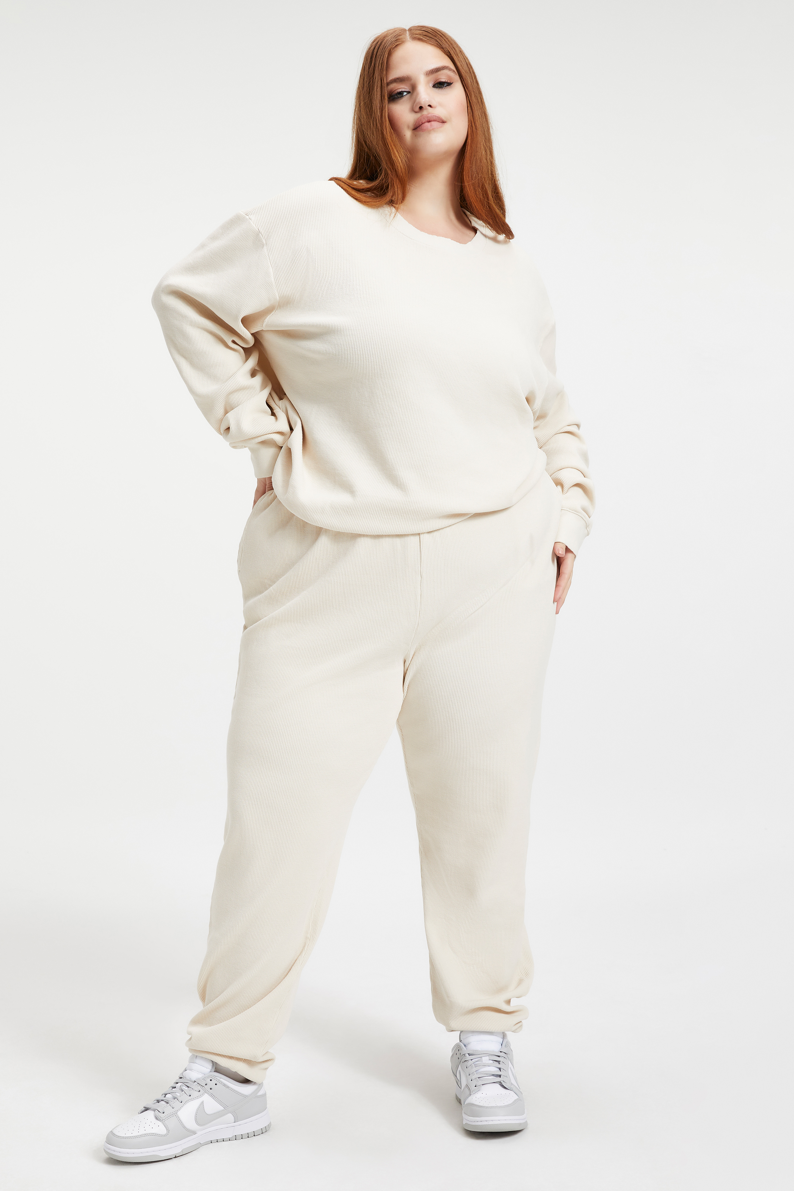 THERMAL BOYFRIEND SWEATSHIRT in BONE001 styled with our THERMAL BOYFRIEND SWEATPANT in BONE001, or THERMAL BIKE SHORT in BONE001