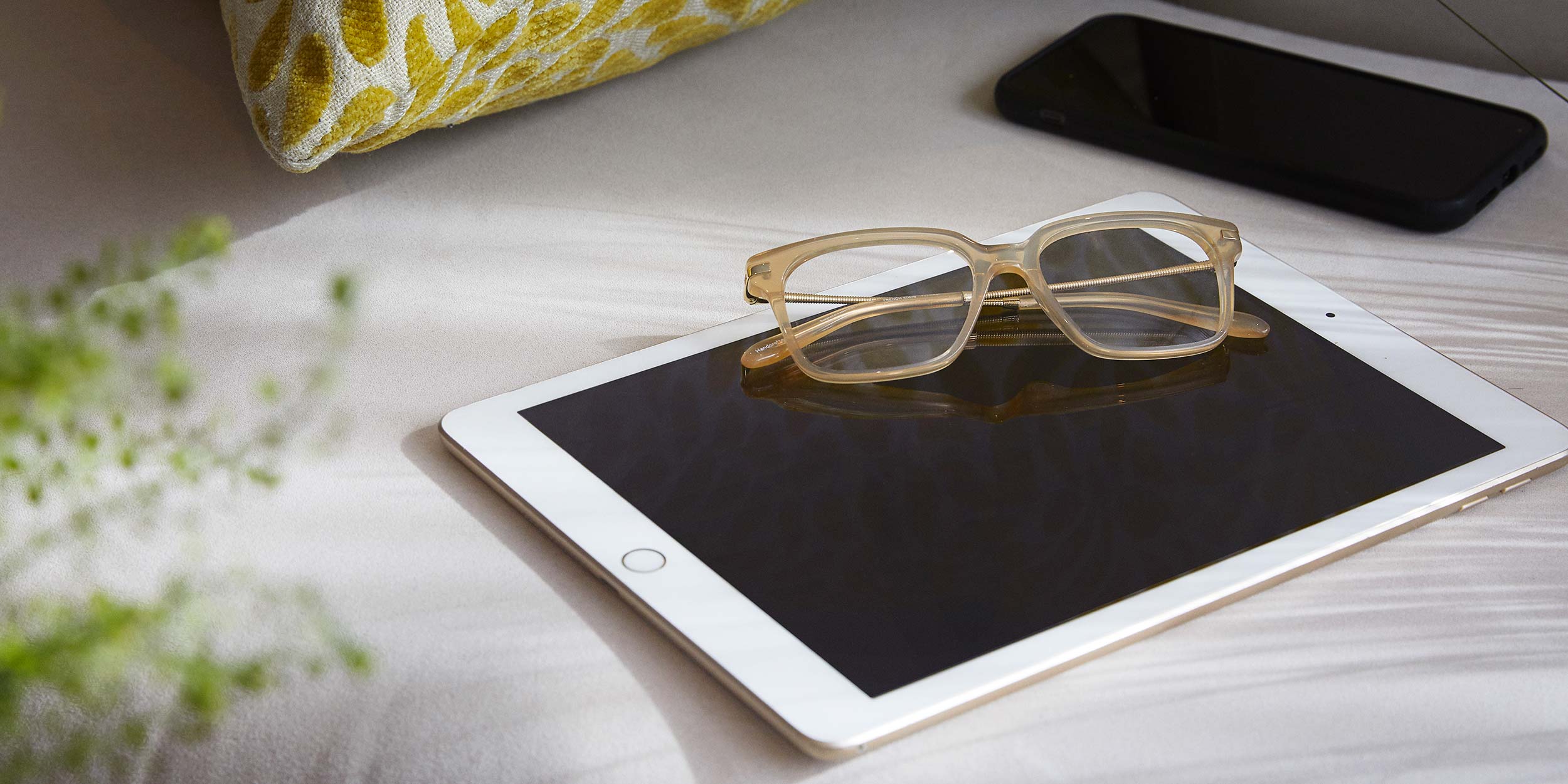 Photo Details of Sasha Blue Light Caramel Marble Blue Light Glasses in a room