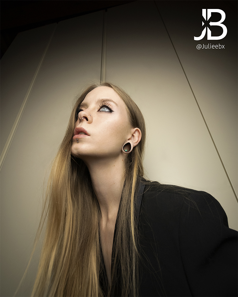 Women wearing classy  Blue Opal & Black Steel Teardrop Tunnel / Plug / Gauge