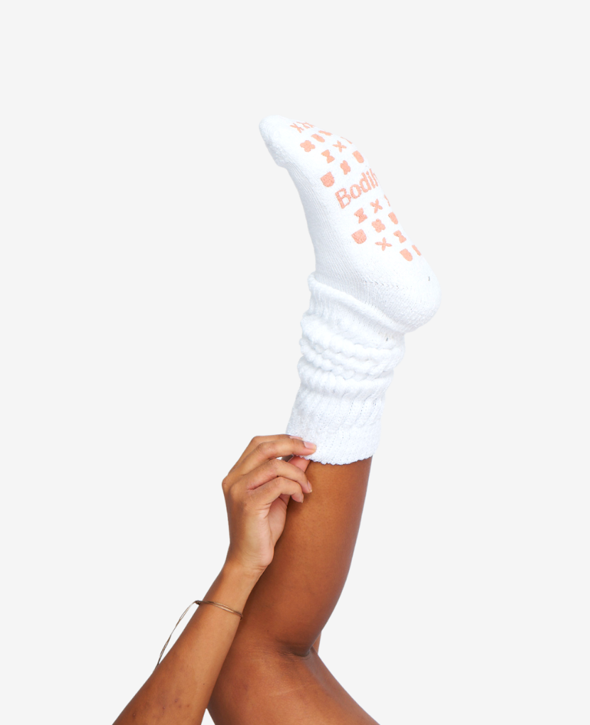 Introducing our cozy, comfy foam-treaded socks in a brand new white and clay color by Brooklyn Decker.