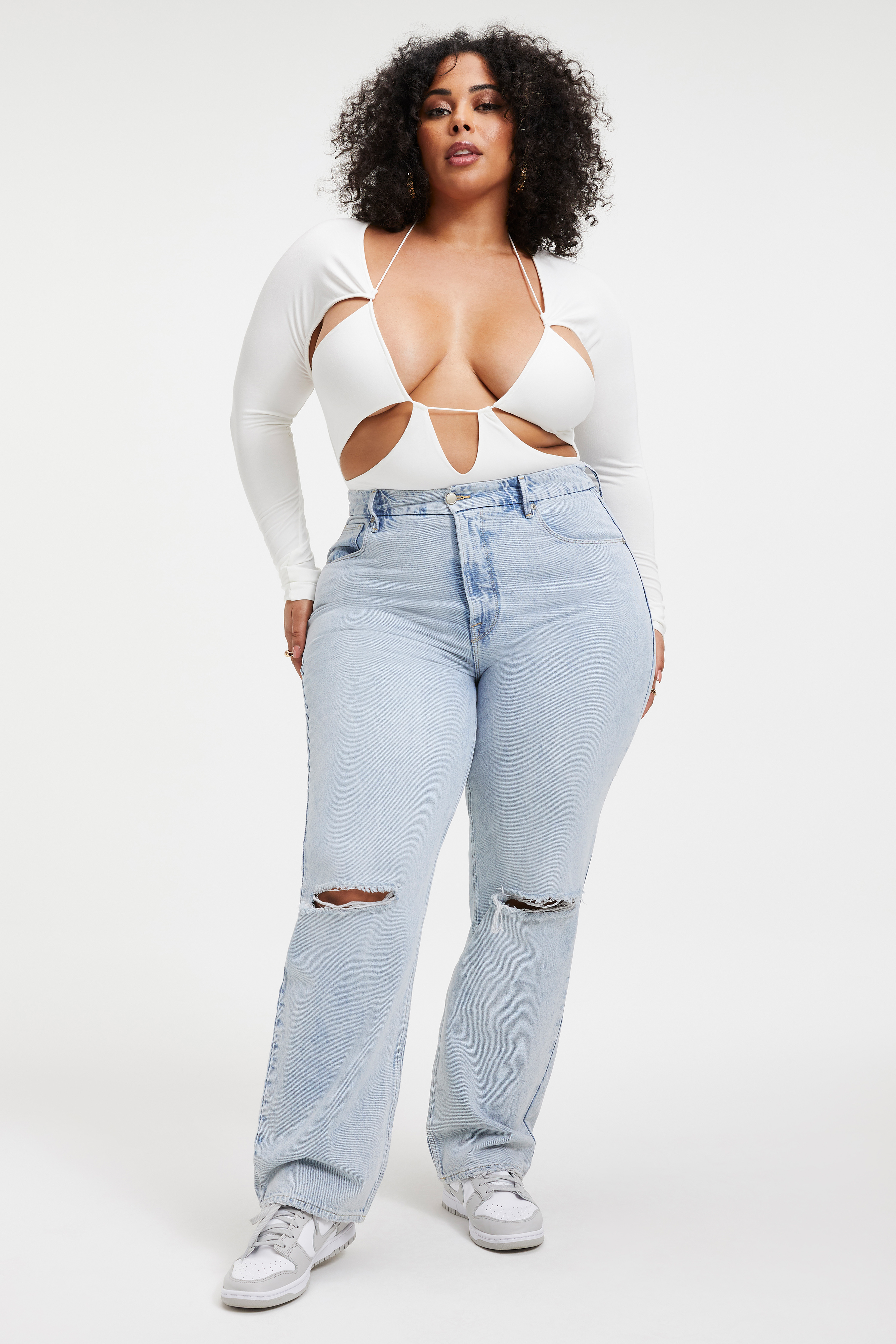 GOOD TOUCH CUT EXTREME BODYSUIT in IVORY001 styled with our GOOD '90s JEANS in BLUE813, GOOD '90S JEANS in BLUE542,
