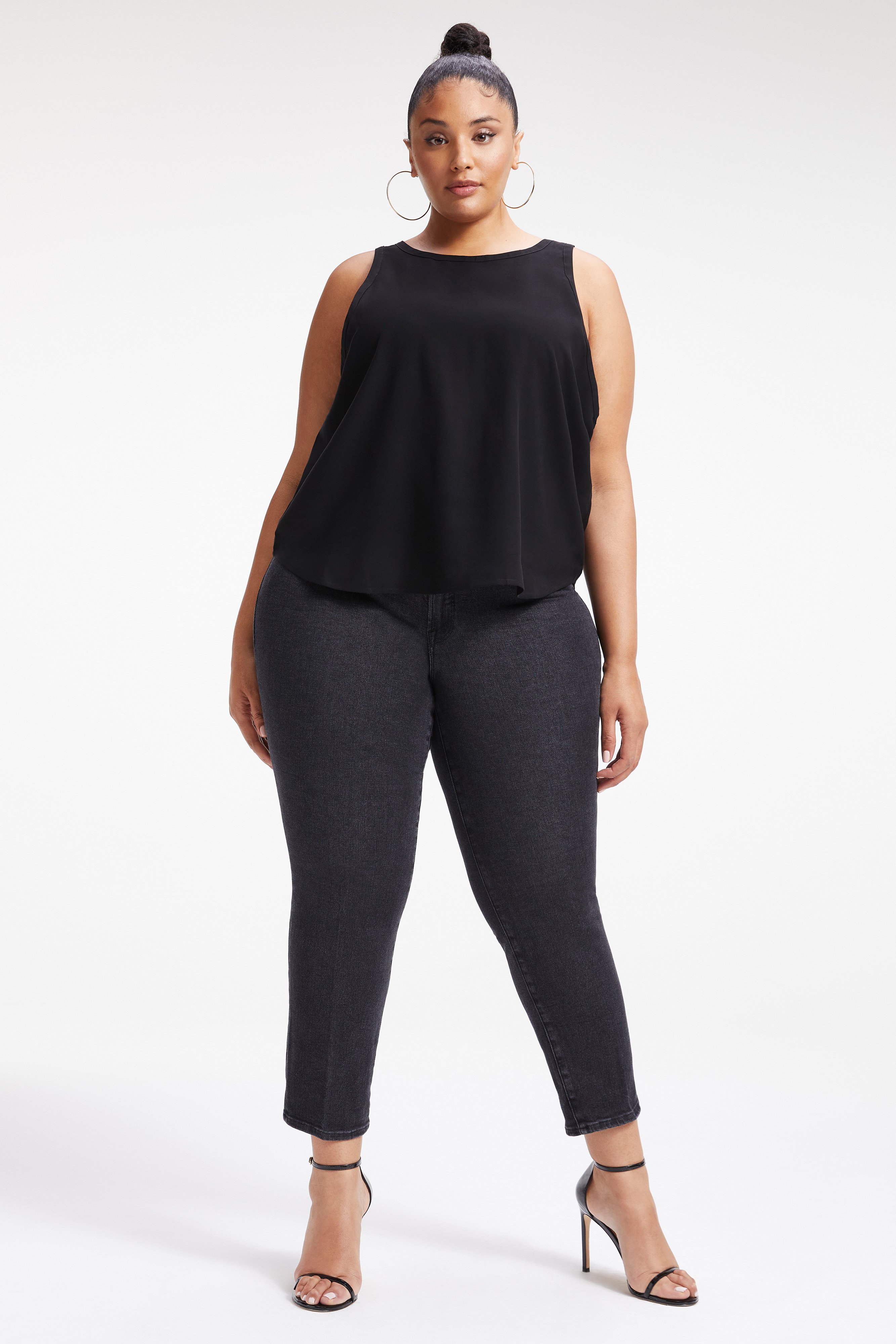 WOVEN CUT IN TANK in BLACK001 styled with our ALWAYS FITS GOOD LEGS JEANS in DEEP BLUE004, GOOD LEGS CROPPED JEANS in BLUE835, or ALWAYS FITS GOOD WAIST JEANS in BLUE821