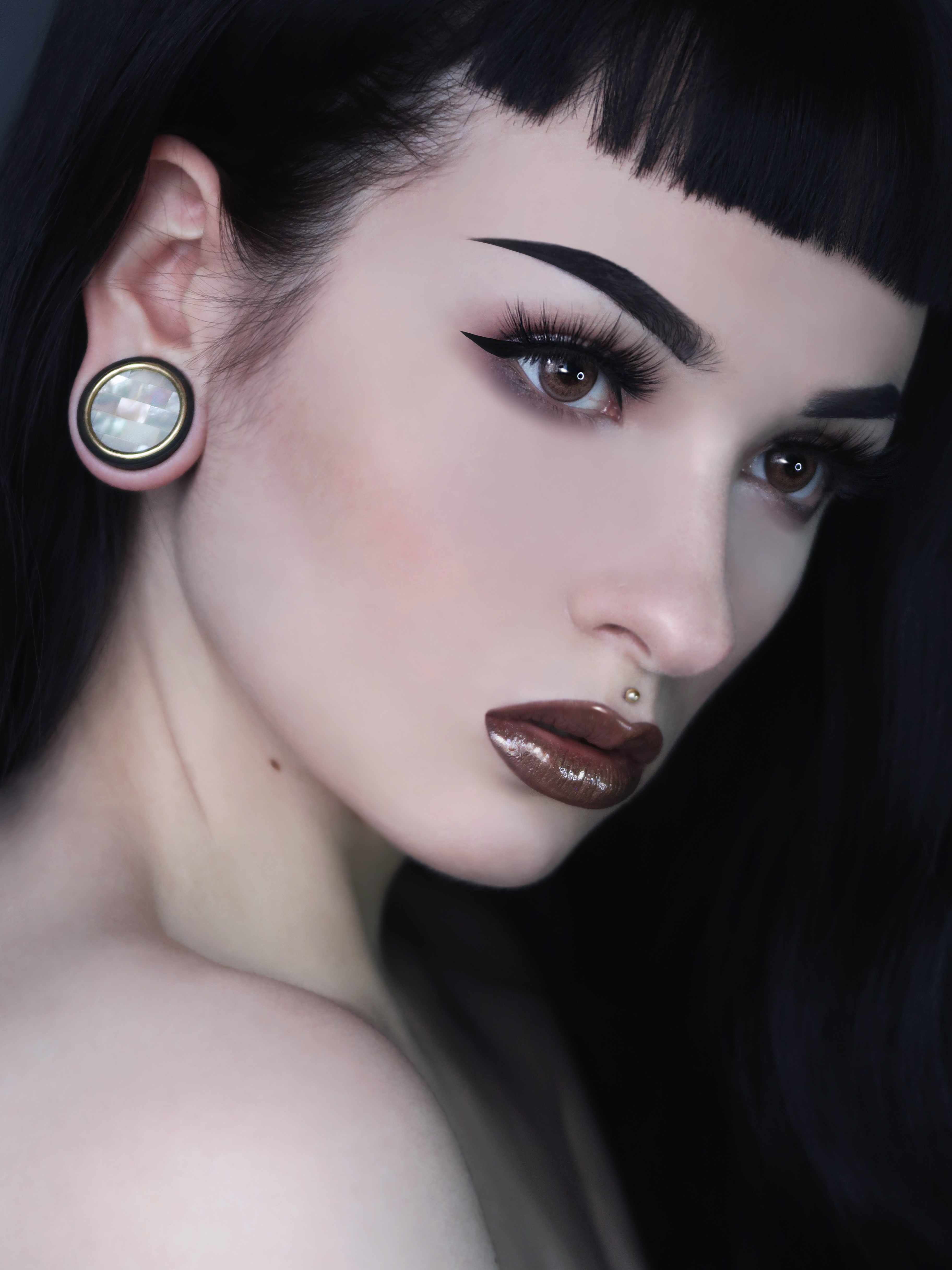 Girl wearing pretty Sono & White Tiled Mother Of Pearl Wood Ear Plug / Gauge