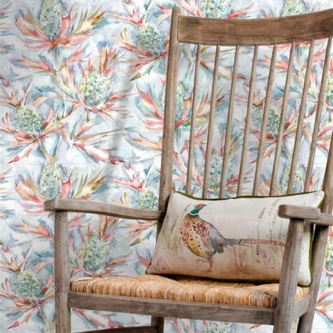 floral wallpaper sample braithwaite next to wooden chair with cushion