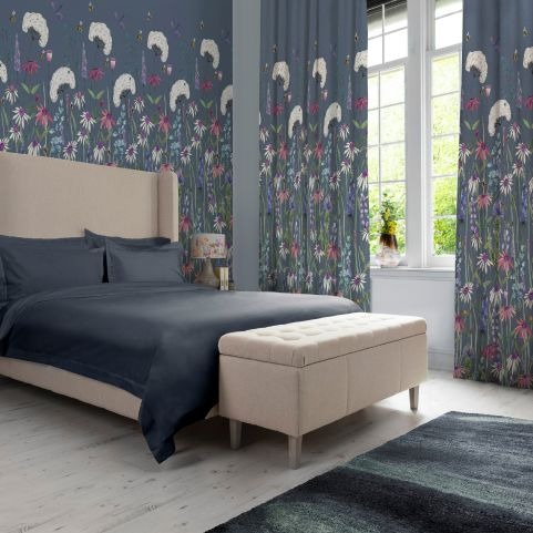 blue floral wallpaper sample florabunda behind navy bed