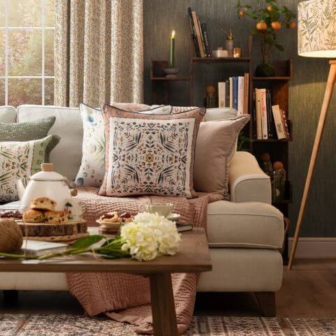 Colourful spring and summer decor arranged in a country style living room.