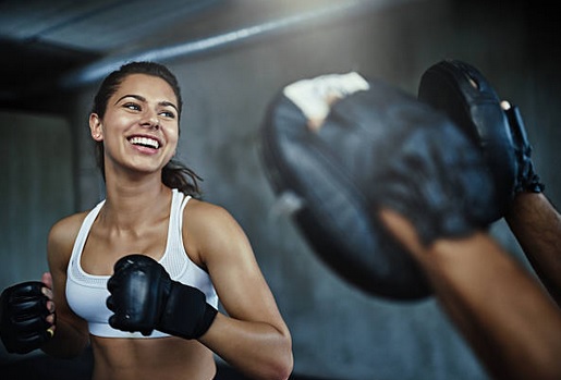 woman boxing after sport energy powder