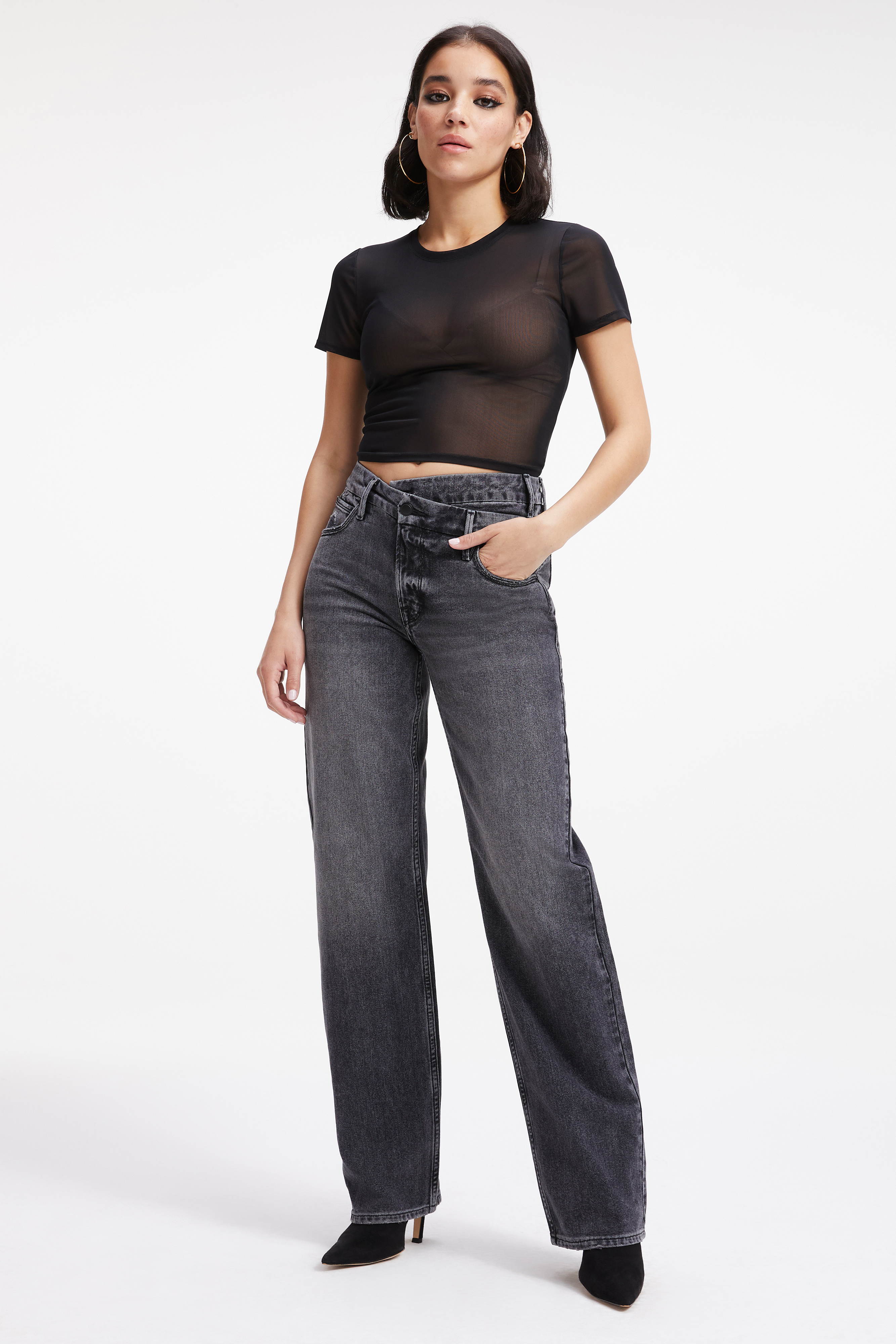 GOOD '90s JEANS in BLACK286 styled with our MESH CROPPED TEE in BLACK001, MESH CORSET BODYSUIT in BLACK001, or MESH CREW NECK BODYSUIT in BLACK001